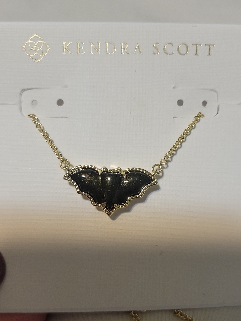 Kendra Scott Black and Gold Bat Pendant Necklace